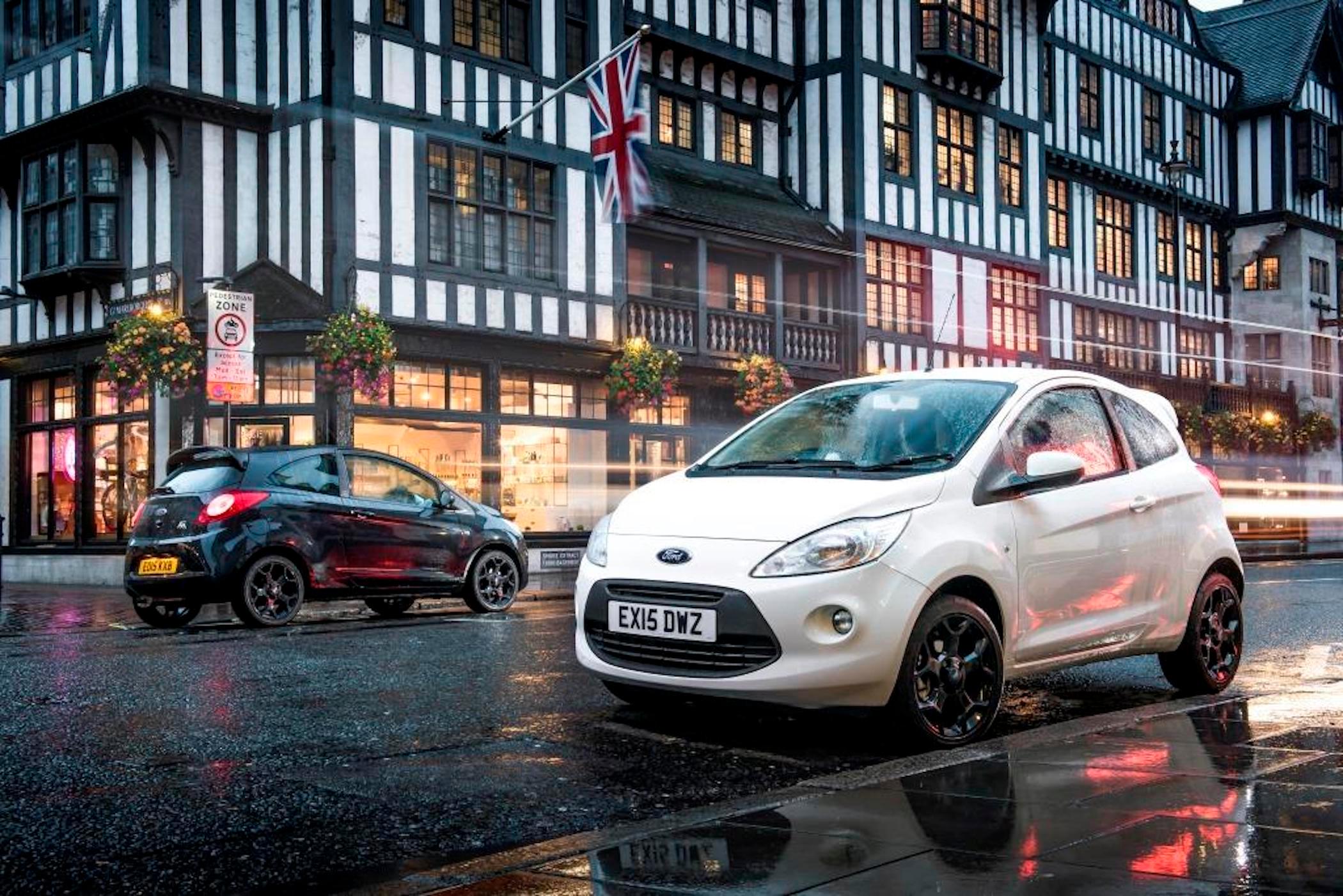 white and black ford ka driving on street