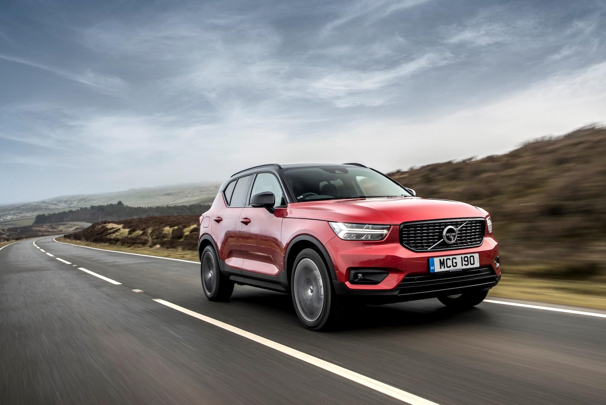 red volvo xc40 driving